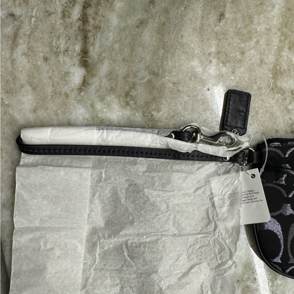 NWT!! Coach wristlet, still in packaging!! Black, silver, and grey. Smoke free - Picture 7 of 9